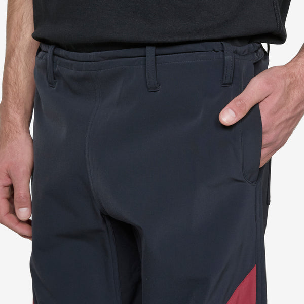 ASICS NOVALIS Liatrisory Trouser Anthracite | Dahlia – Above The