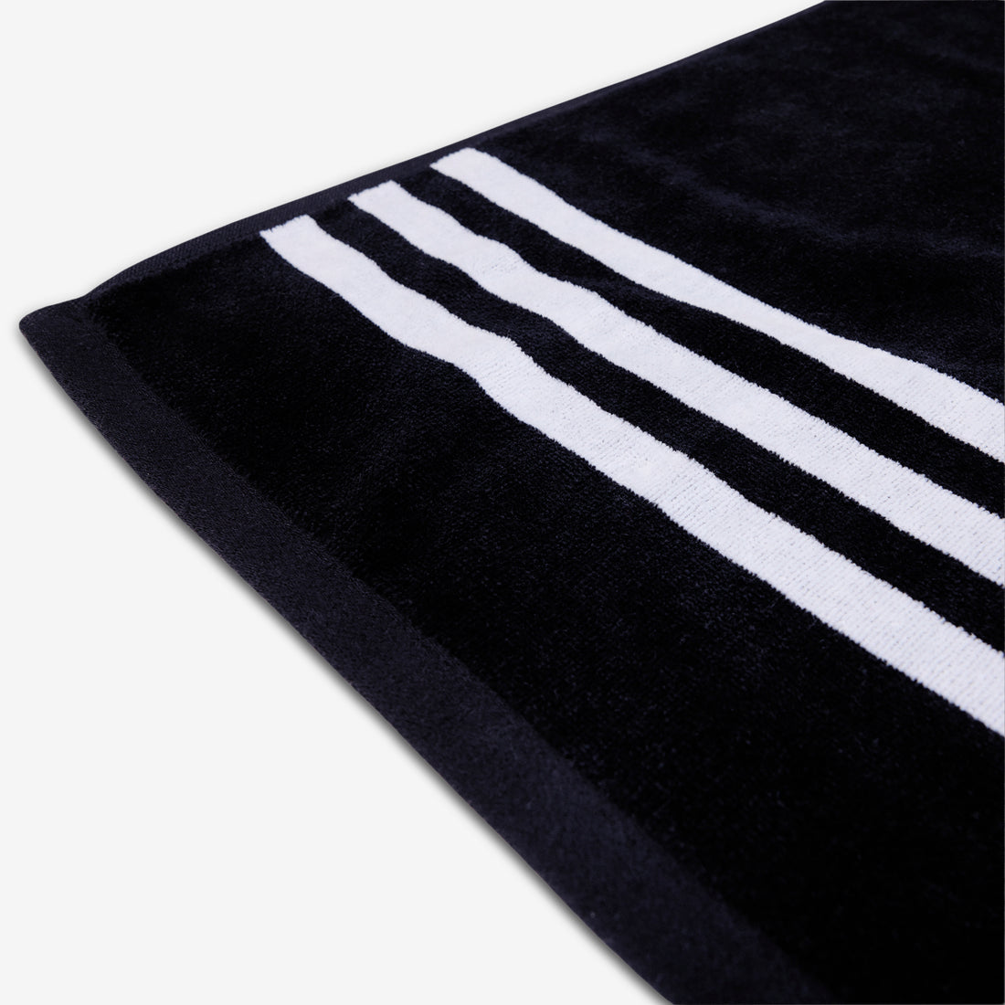 SPZL Mod Trefoil Towel Black | Chalk White Lifestyle