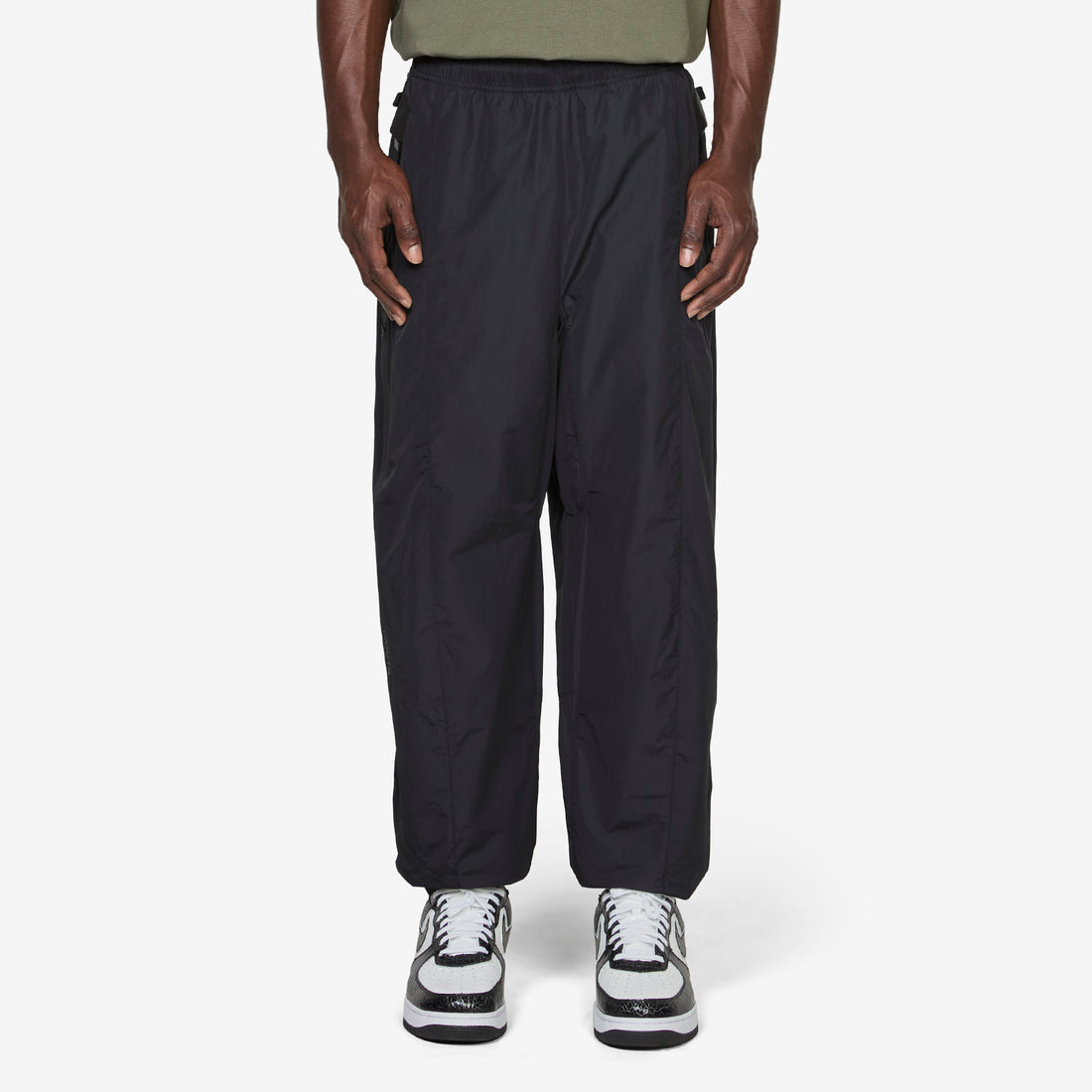 NOCTA Zombie Cut Track Pants Black | Black | Refblk Pants