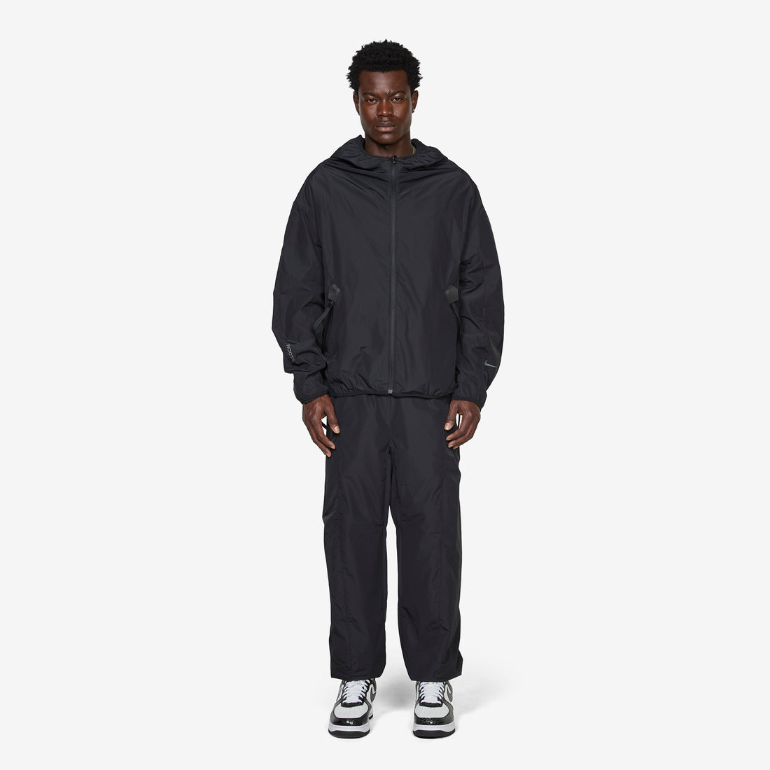 NOCTA Shroud-Cut Track Jacket Black | Black | Refblk Jackets