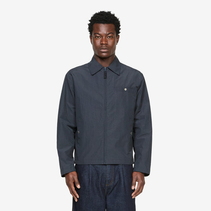 Core Essentials Technical Woven Jacket Blackbird Front