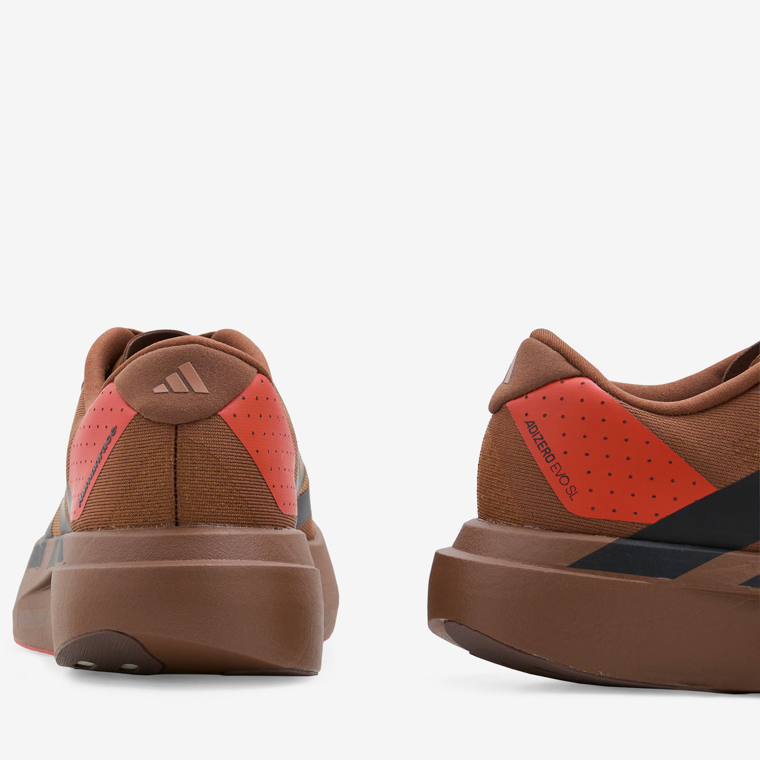 Pharrell Williams x Humanrace Adizero Evo SL Preloved Brown | Core Black | Craft Chili Footwear