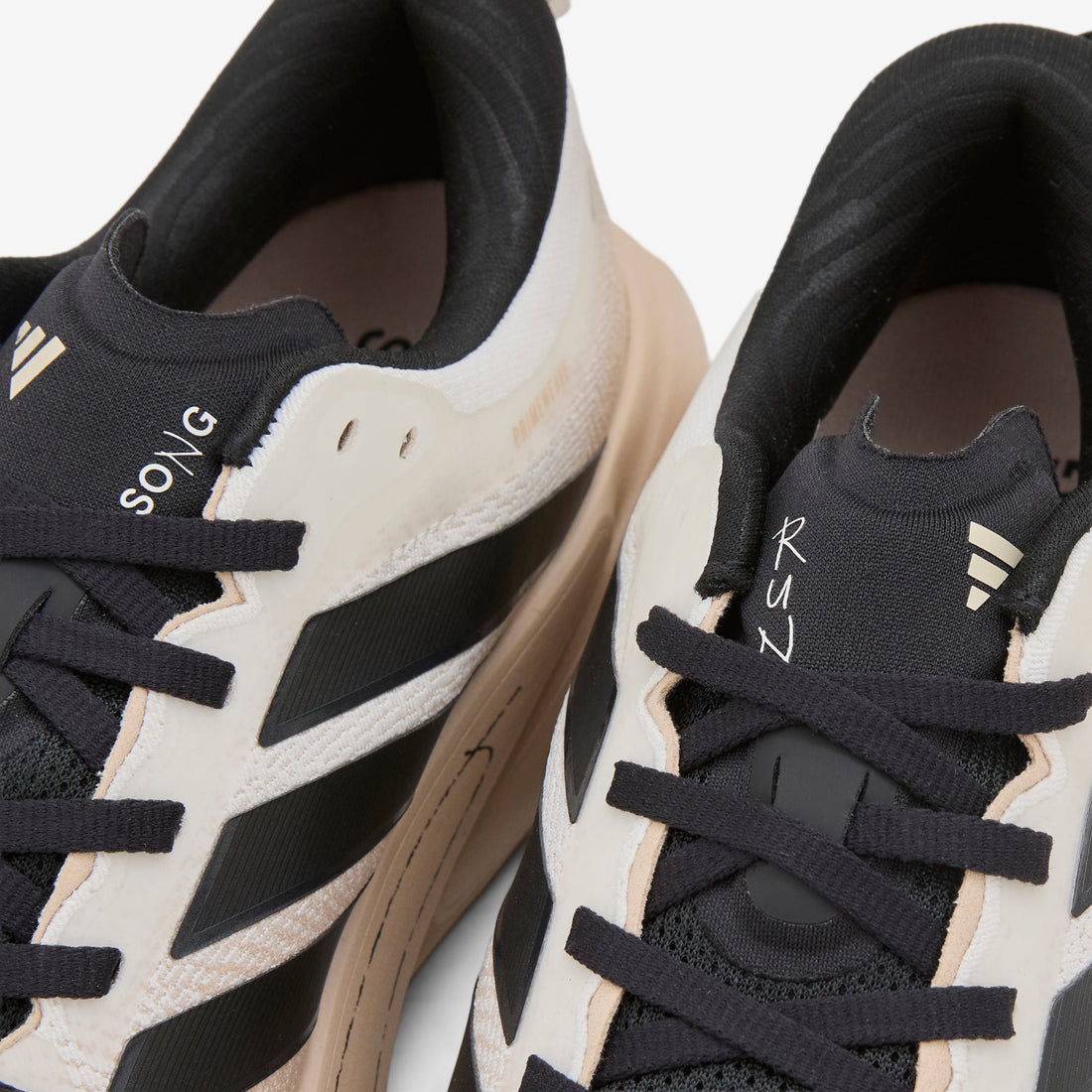 Song for the Mute x Women's Supernova Rise 3 Off White | Core Black | Onix Footwear