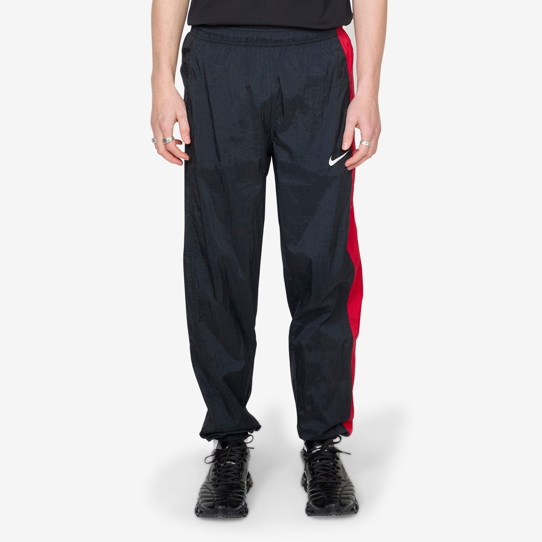 black and red nike tracksuit bottoms