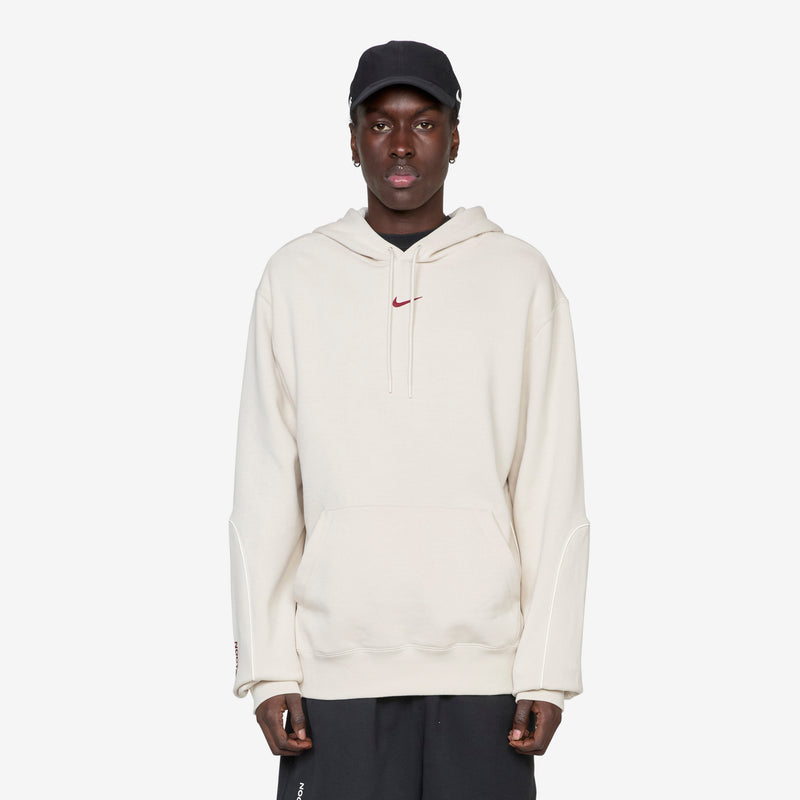 NOCTA Fleece Hoodie Light Orewood Brown | Team Red Jumpers