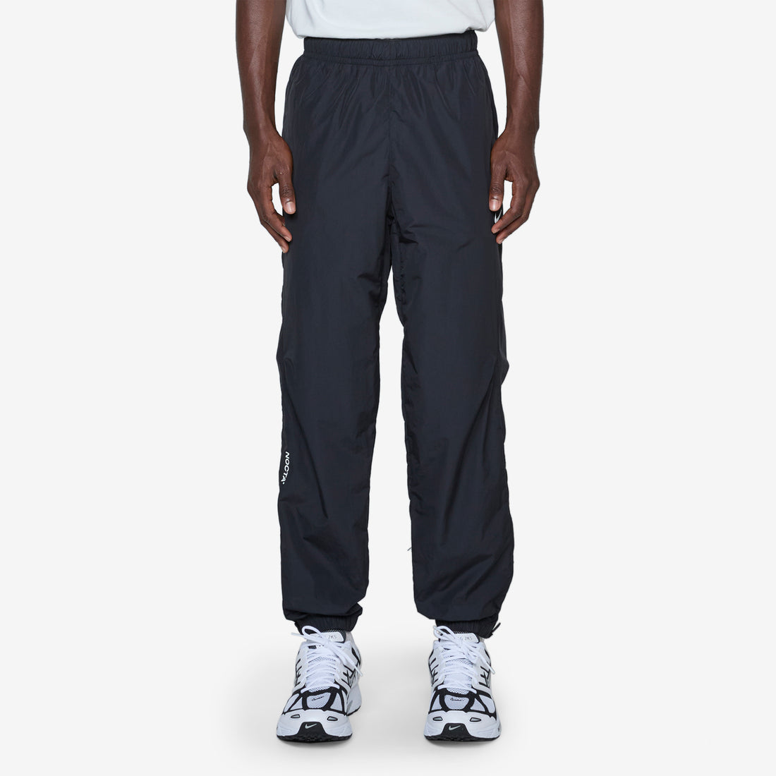 NOCTA Woven Track Pant Black | Black | White Pants
