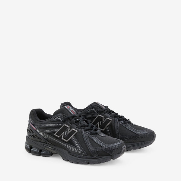 1906R Black | Silver Metallic Footwear