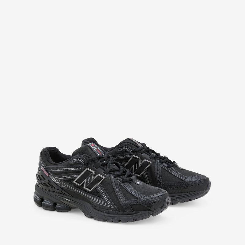 1906R Black | Silver Metallic Footwear