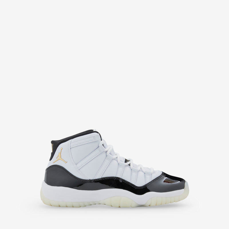Grade School Air Jordan 11 Retro White Metallic Gold Black Above The Clouds