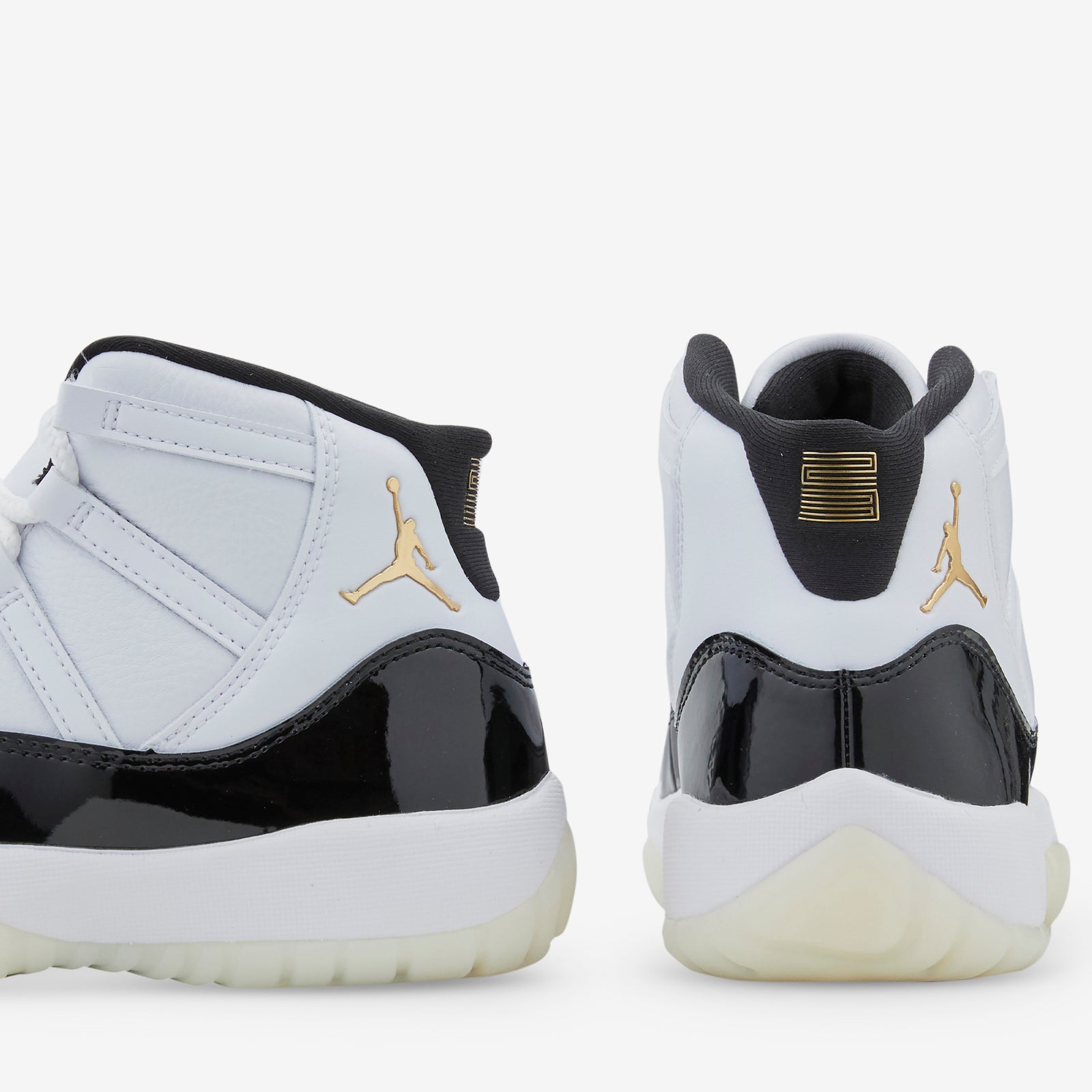 Grade School Air Jordan 11 Retro White Metallic Gold Black Above The Clouds