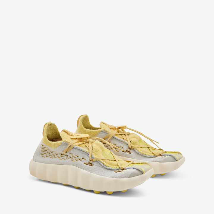 Mind 002 Flyknit Light Bone | Saturn Gold | Infinite Gold Front