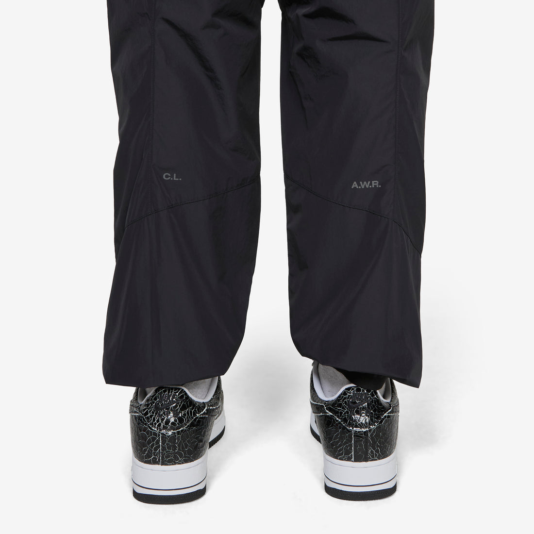 NOCTA Zombie Cut Track Pants Black | Black | Refblk Pants