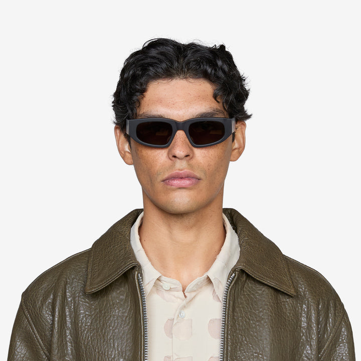 Eclipse Matte Black | Green Solid Lens Front