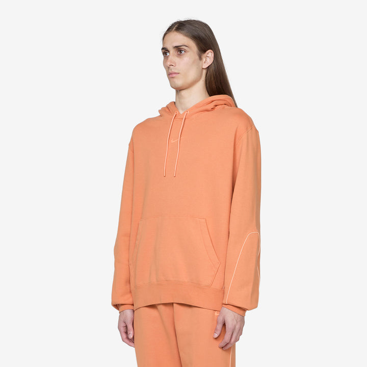 NOCTA Hoodie Hot Curry | Orange Trance | Orange Trance