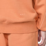 NOCTA Hoodie Hot Curry | Orange Trance | Orange Trance